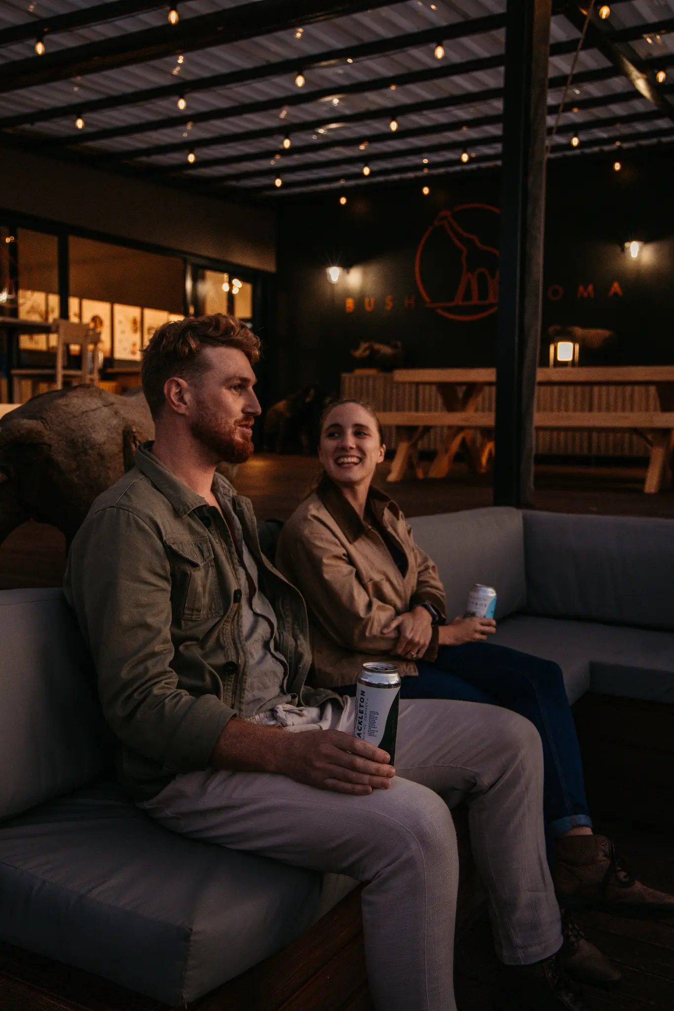 Guests relaxing together at Longhill Reserve's Bush Boma